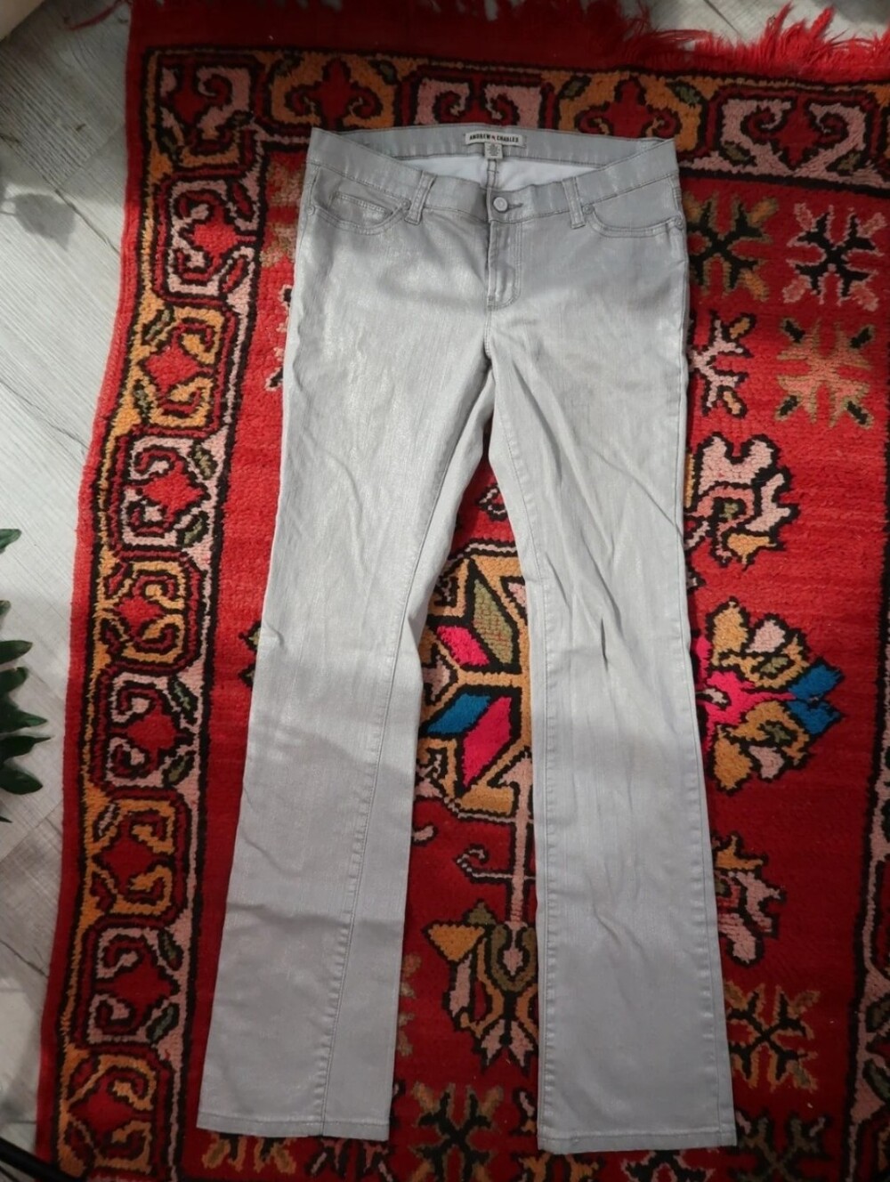 Silver metallic jeans in vintage style from the 2000s that present a striking sh